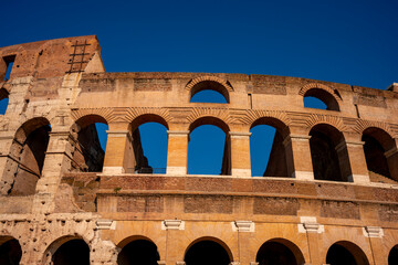 Obraz premium The Colosseum is an elliptical amphitheatre in the centre of the city of Rome, Italy, just east of the Roman Forum. It is the largest ancient amphitheatre ever built, and is still the largest standing