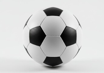 Naklejka premium Close up view of a soccer ball with black and white hexagons isolated on white background