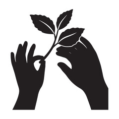 A silhouette of a hand holding a plant sprout with leaves.
