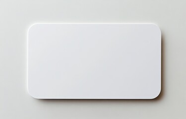 Blank white rectangular card on light gray surface
