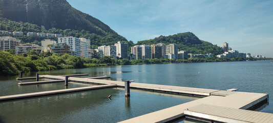 Rio de Janeiro Pedra da Gávea hill city neighborhood horizon landscape deck rowing kayak sport vegetation lake lagoon water fish bird sky cloud nature life vacation beauty leisure