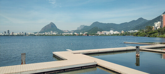 Rio de Janeiro Pedra da Gávea hill city neighborhood horizon landscape deck rowing kayak sport vegetation lake lagoon water fish bird sky cloud nature life vacation beauty leisure