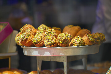 Delightful pistachio pastries served in a bakery display case