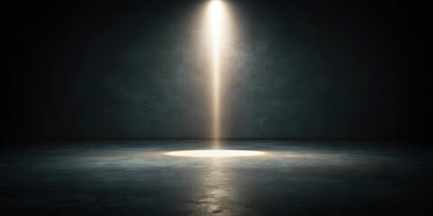 Minimalist darkened space illuminated by a single bright light source