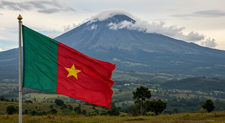 Cameroon's flag waves proudly with the majestic Mount Cameroon in the background