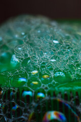 water drops on green glass