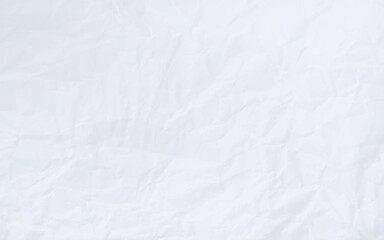 Top view and full frame of wrinkled or crumpled white stencil paper texture is used for wrinkled or crumpled white paper background texture in decorative art work.