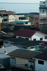 city view, the old architecture of reveals a tapestry of residential buildings and rooftops under a blue sky