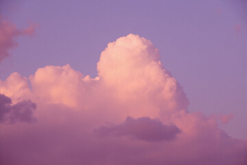 pink sky with some clouds in it