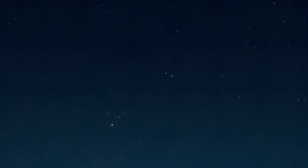 Fototapeta premium Dark Blue Night Sky with Scattered Stars A Celestial Backdrop
