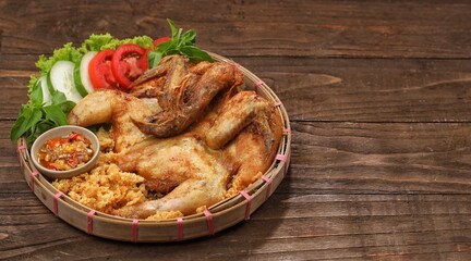 Ayam goreng kremes. Kremes chicken is made from seasoned chicken coated with jeladren (thin batter) made from seasoned wheat flour and fried until golden brown.