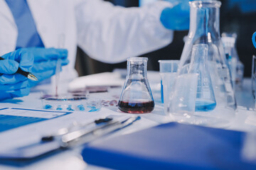 Researcher using a professional microscope