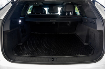 Large black empty car trunk. Open car trunk close up