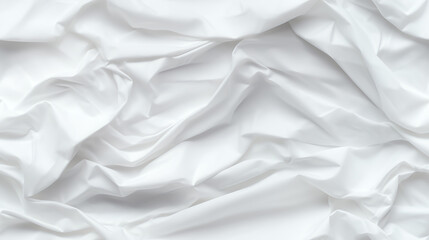 Obraz premium Close-up of textured white crumpled fabric with soft folds.