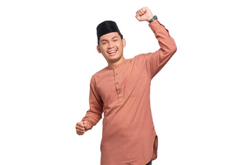 Fototapeta premium Excited Asian Muslim man celebrating victory isolated on transparent background