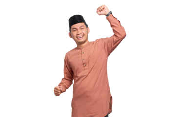 Excited Asian Muslim man celebrating victory isolated on transparent background
