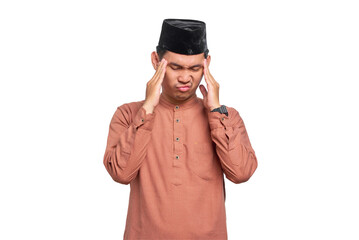 Stressed Asian Muslim man touching his temples and having headache isolated on transparent background