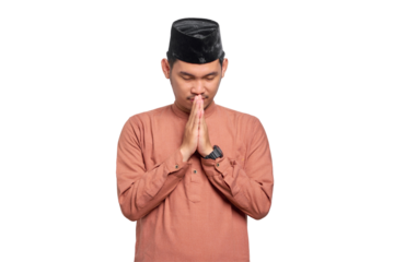 Portrait of Asian Muslim man holding hands in pray near mouth isolated on transparent background
