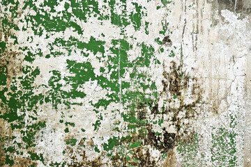 Green And white old wall background with copy space. Old wall texture cement dirty gray with black background. Side view. Empty, free space, broken, crack.