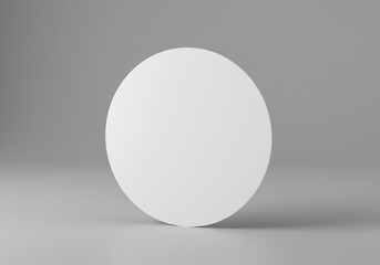 Blank Round White Board Display on Gray Surface