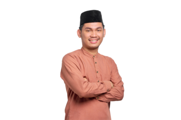 Smiling young Asian Muslim man crossed arms and looking confident isolated on transparent background