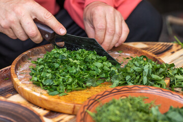 fresh greens from the garden, prepared for summer salad in the country.