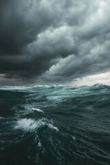 Obraz premium Dramatic seascape with turbulent waves under a stormy sky evoking power and moodiness, capturing a sense of nature's raw energy and atmospheric depth in a captivating scene