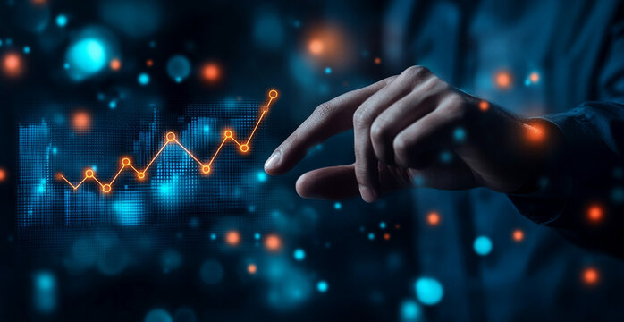 _E Businessman touching an upward graph line icon representing growth and success on a virtual screen, against a blue background.