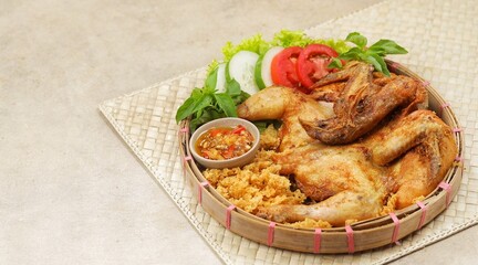 Ayam goreng kremes. Kremes chicken is made from seasoned chicken coated with jeladren (thin batter) made from seasoned wheat flour and fried until golden brown.