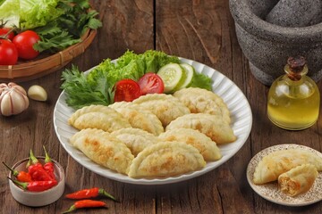 Cireng filled with shredded chicken is a variant of a traditional Sundanese snack made from fried tapioca flour filled with shredded and seasoned chicken.