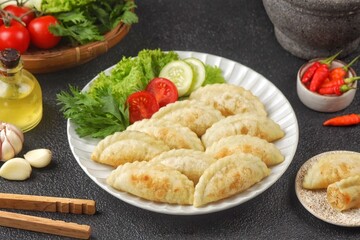Cireng filled with shredded chicken is a variant of a traditional Sundanese snack made from fried tapioca flour filled with shredded and seasoned chicken.