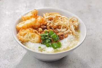 Bubur ayam. Chicken porridge is a typical Indonesian dish made from rice cooked in lots of water