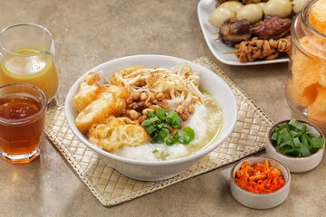 Bubur ayam. Chicken porridge is a typical Indonesian dish made from rice cooked in lots of water