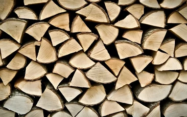 Fototapete Rund Stack of Firewood, Wooden Logs, Natural Fuel, Winter Warmth, Cozy Fireplace, Rustic Texture, Wooden Background, Natural Resource,  Energy Source,  Cut Wood © Samima