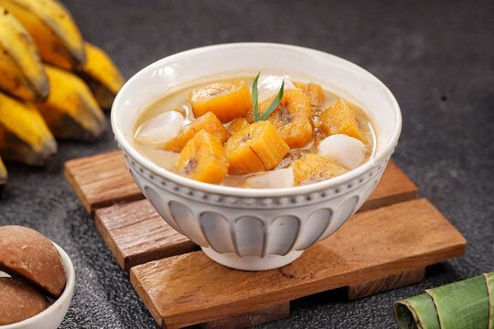 Kolak Pisang is an Indonesian dessert made from bananas, pumpkin cooked with coconut milk, palm sugar and pandan leaves.