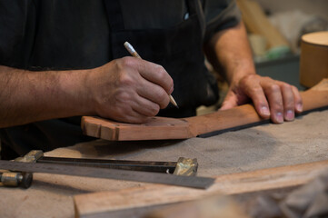 Luthier at work in his workshop