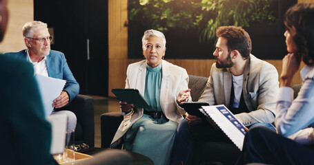 Business people, meeting and planning in workplace, conversation and brainstorming for creative project. Group, employees and leader in office, teamwork and feedback for ideas, talking and proposal