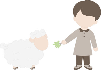 A boy feeding a sheep