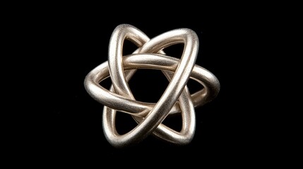 A silver ring with a complex knot design.