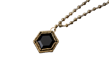 Black hexagonal pendant with gold trim, hanging from a beaded chain on black background