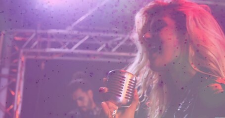 female singer and musician performing music concert, with animated microphone icon and light rays