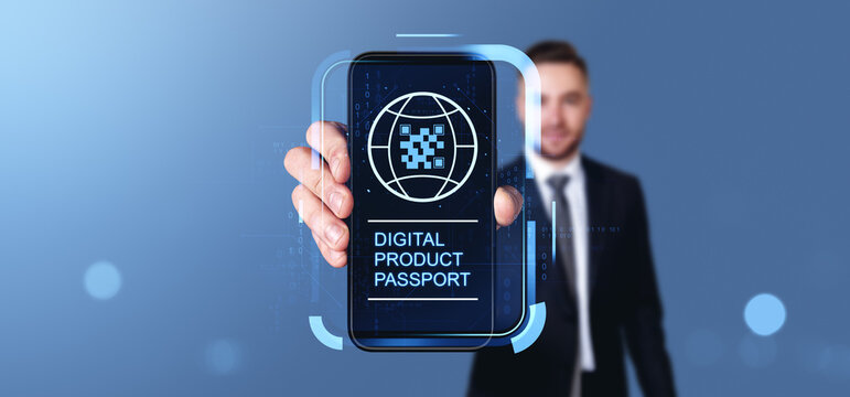 Businessman holding smartphone with digital product passport int - Powered by Adobe