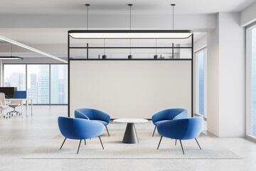 Modern office lounge area with four blue chairs and round table on carpet, surrounded by glass windows and minimal white walls. 3D Rendering. 3D Rendering