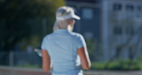 Fototapeta premium Fitness, back and tennis player on court for training, championship or match with exercise. Sports, blur and female athlete with workout, game or practice outdoor on field at stadium for hobby.
