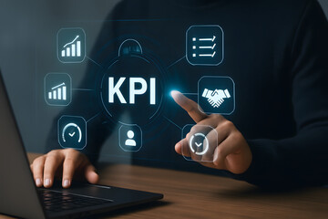 KPI Dashboard Analytics: A person interacts with a holographic KPI dashboard, showcasing key performance indicators and data analysis for business strategy.