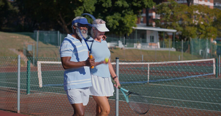 Tennis court, friends and mature couple for workout, game or competition. Fitness, sports racket and athlete man with woman ready for training, match and outdoor weekend hobby for health and wellness