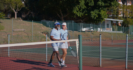 Tennis court, friends and people prepare for fitness, game or competition. Workout, sports racket and mature athlete man with woman for training, match or outdoor weekend hobby for health or wellness