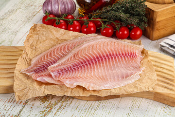 Raw Tilapia fish fillet slice