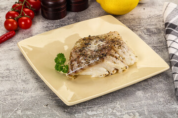 Baked cod fish fillet with spices
