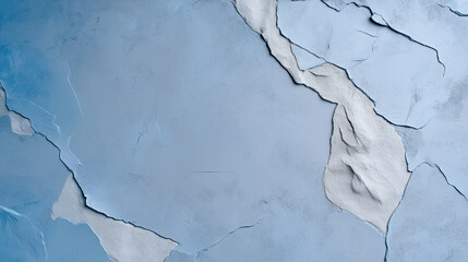 Textured blue wall with peeling and weathered paint layers